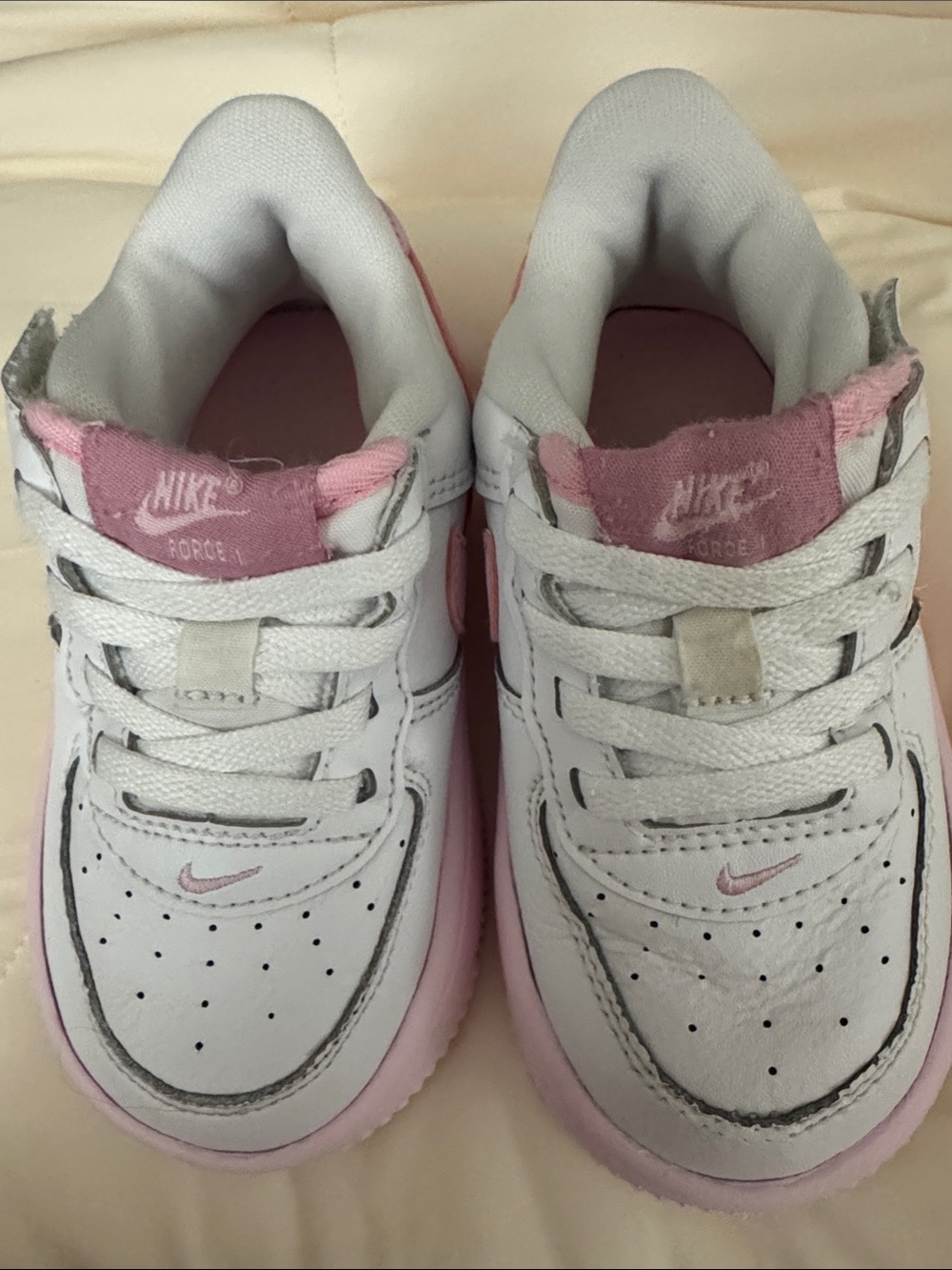 Nike Kids White and Pink Low-Top Sneakers. Good condition. Washed.